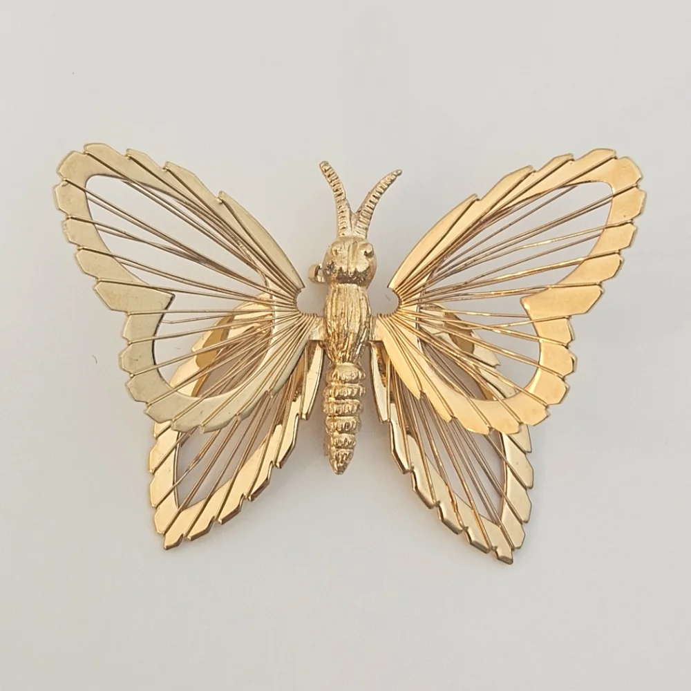 Vintage Monet gold tone butterfly brooch signed